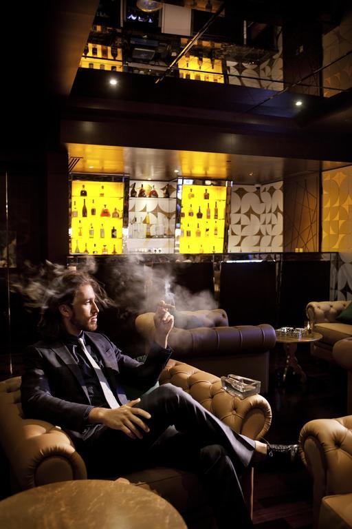 The Domain Bahrain Hotel And Spa - Adults Friendly 16 Years Plus Манама Экстерьер фото A man smoking in a nightclub